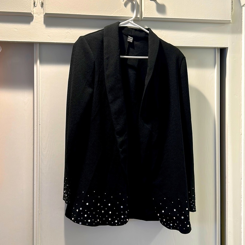 Beautiful black blazer with bling.  Great for the office and a night out!